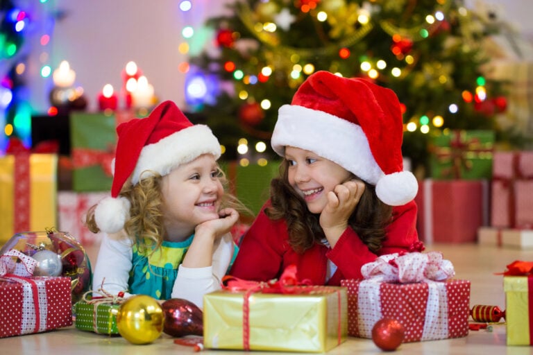 little girls  with the Christmas gifts