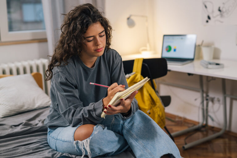 College student studies for exam