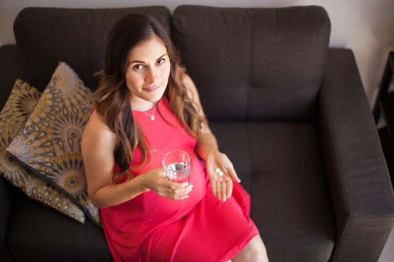 mother about to take some pills