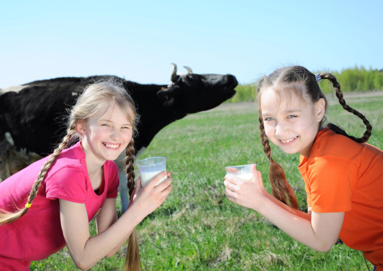 Little girls drinking milk